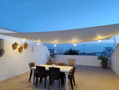 Appartamento in centro con posto auto e ampi spazi esterni. Torre San Giovanni - Foto principale