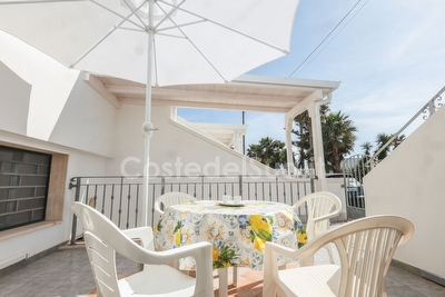 Casa spaziosa ben arredata con mare di sabbia vicino. Torre Pali - Foto principale