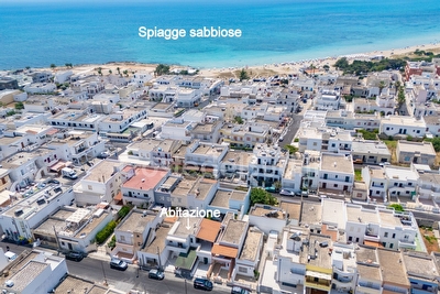 Appartamento con grande porticato centro e mare di sabbia a piedi. Lido Marini - Foto principale